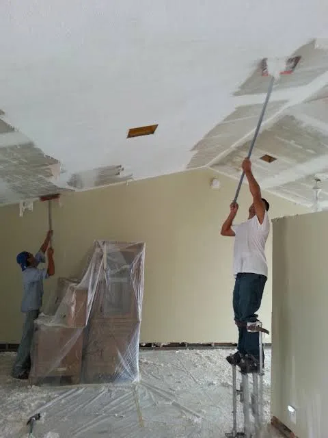 Popcorn ceiling ready for asbestos testing in an older Massachusetts home