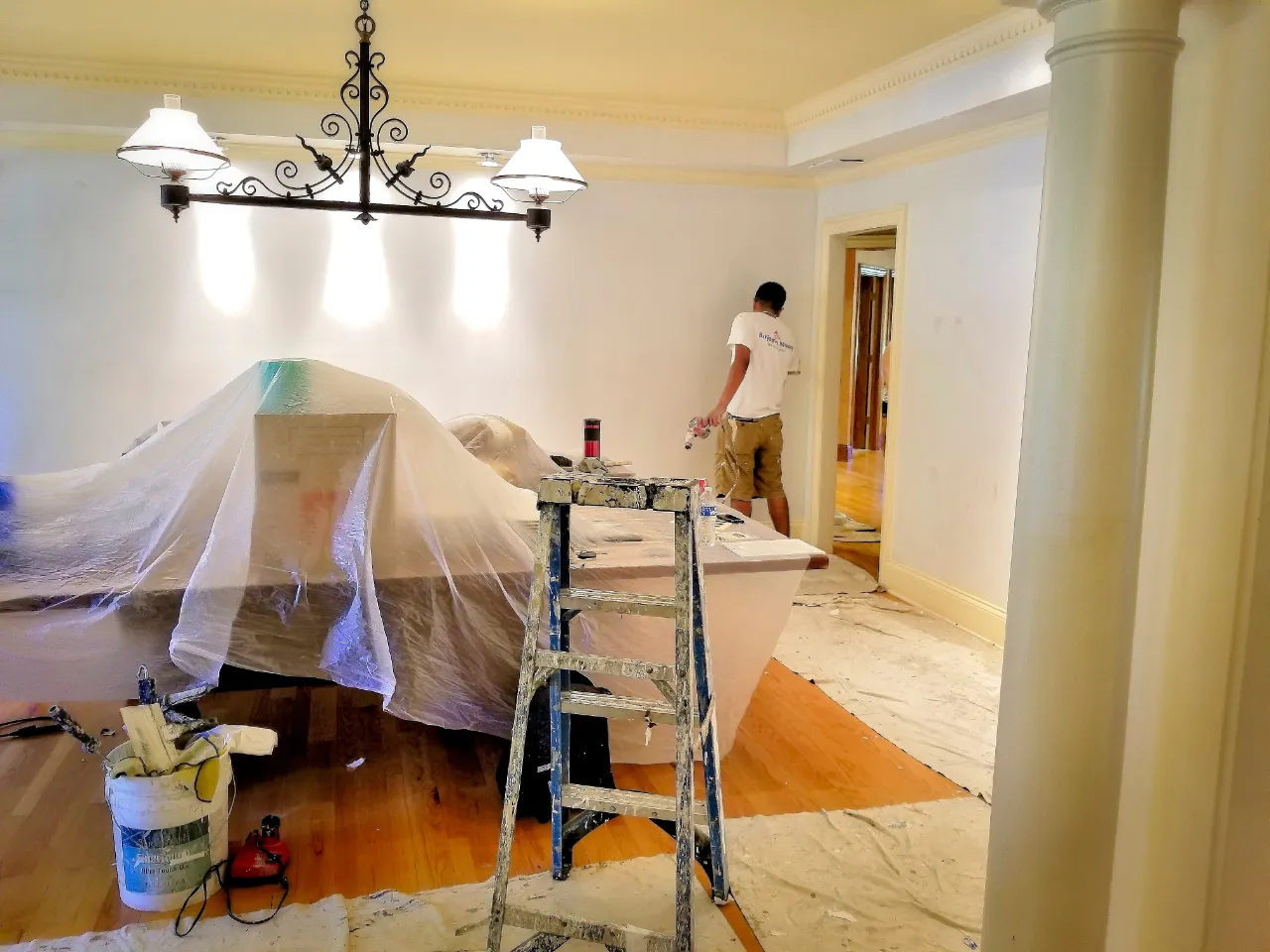 Interior painting with sprayer in a Massachusetts home
