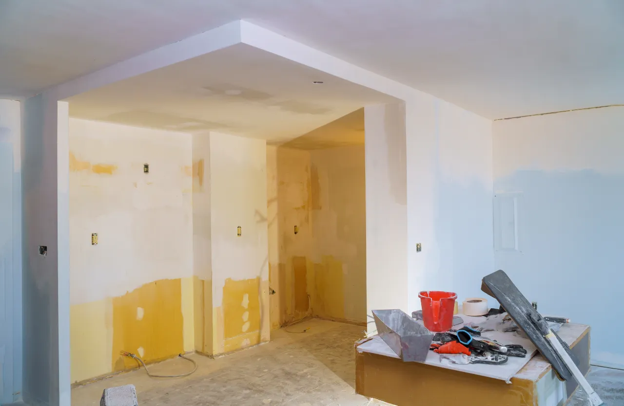 Room undergoing renovation and painting at Level 3 finish in a Massachusetts home