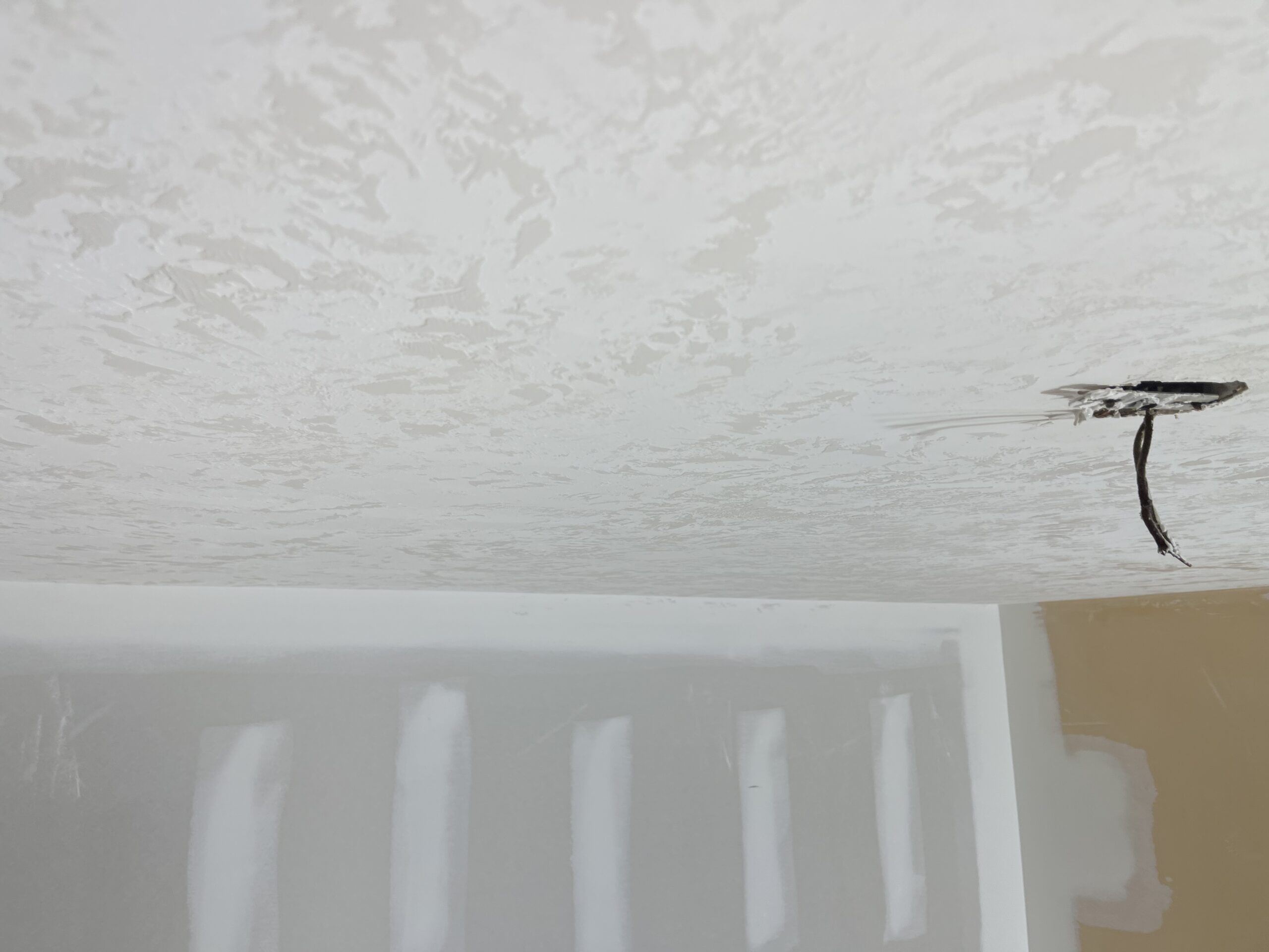 Taping and joint finishing